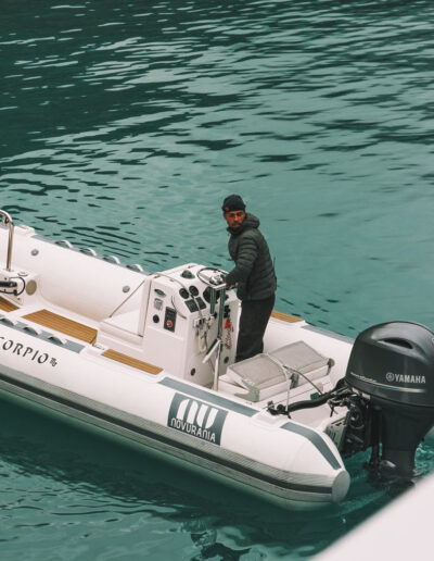 Young man docking a tender in Alaska