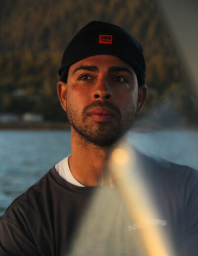 Portrait of young man with beanie, during the golden hour in Alaska