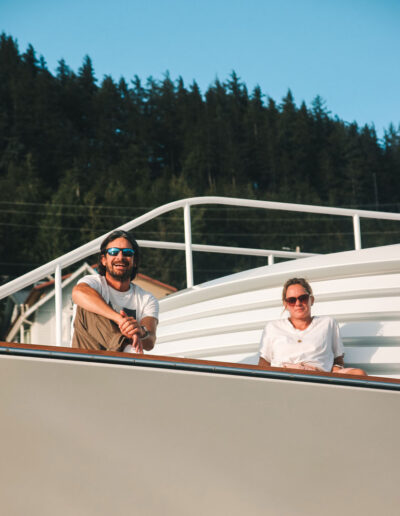 Man and woman sitting outside on the deck