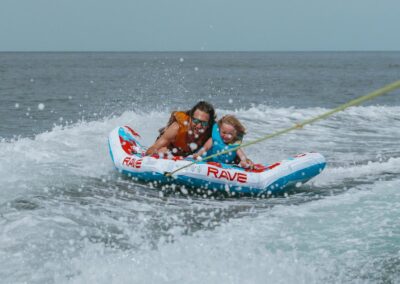 Water activities - Man and child tubing in Mexico.